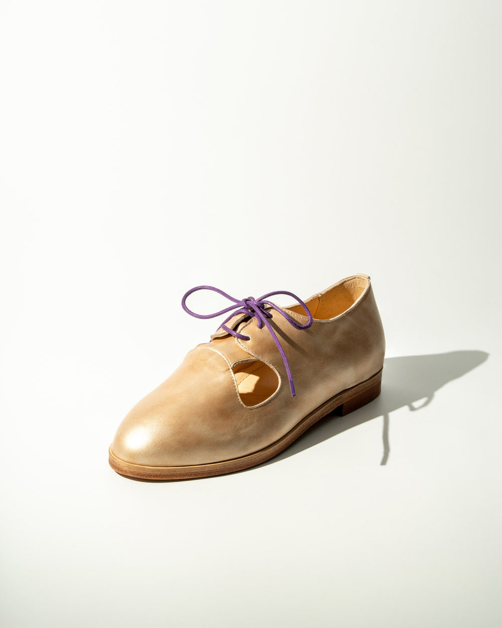 Brushed Gold Ava Derby, three-quarter view