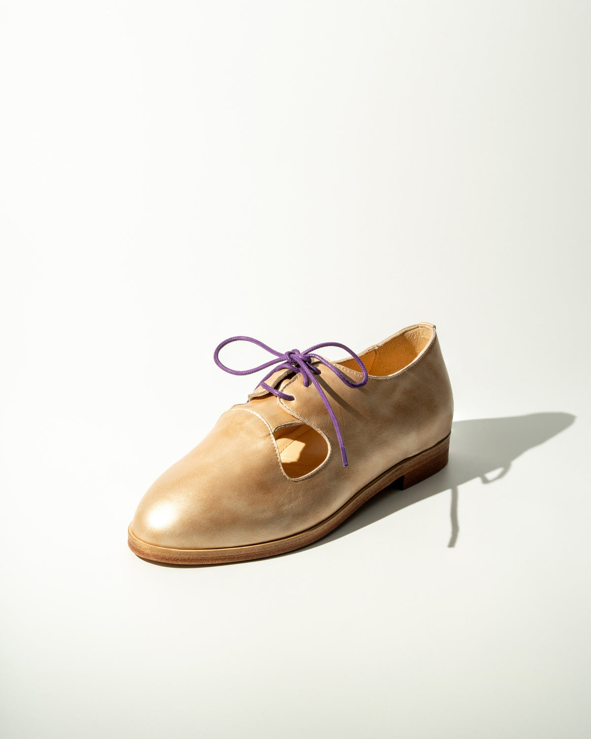 Brushed Gold Ava Derby, three-quarter view
