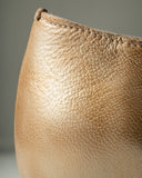 Brushed Gold Ava Derby, cut-out detail