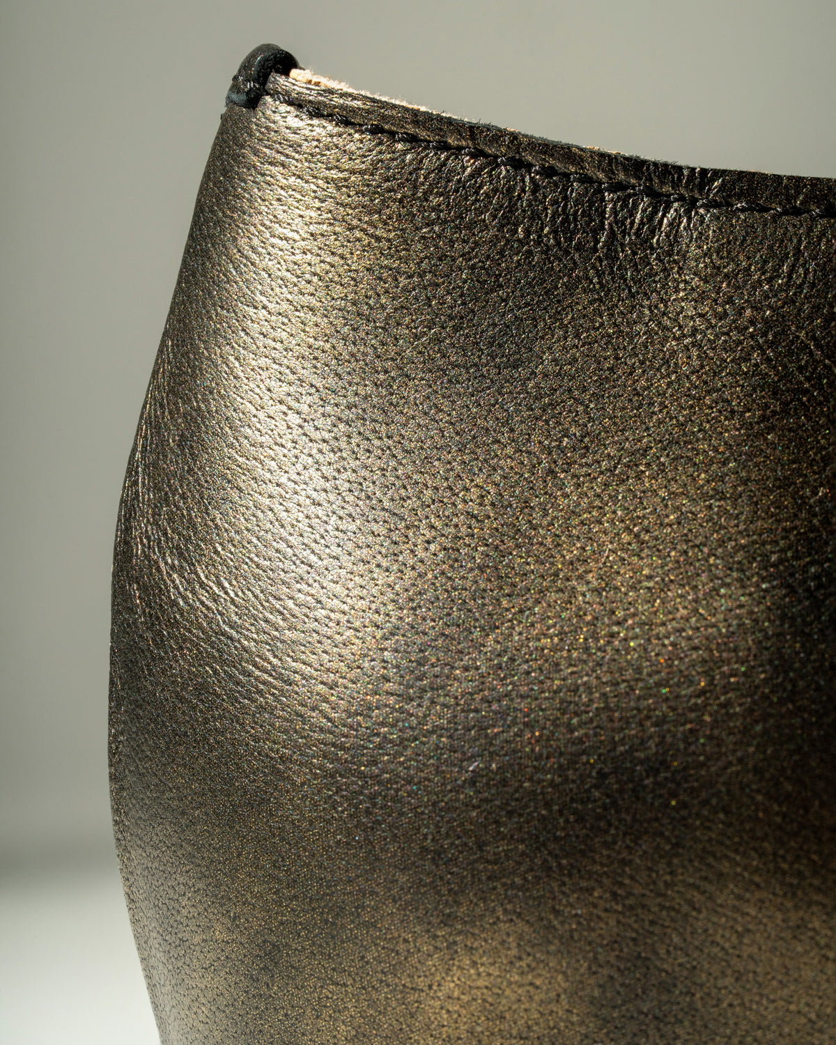 Juniper Ava Derby, cut-out detail