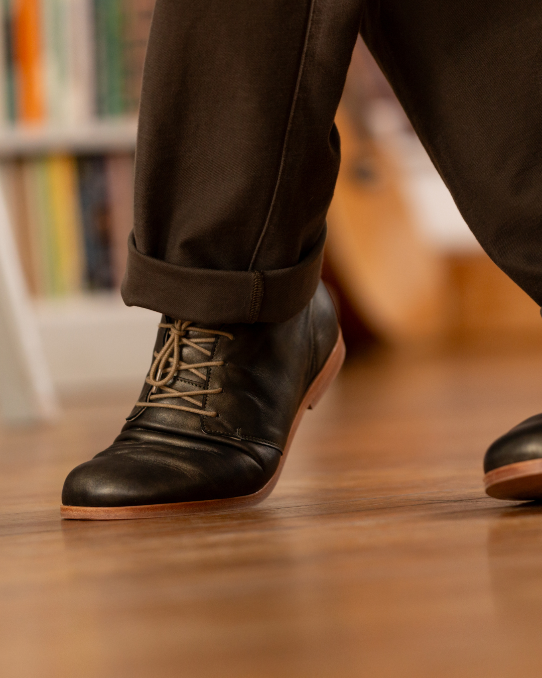 Juniper Cat Desert Boot, worn on a wood floor